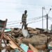 A child is seen among rubbles of the district of Attecoube in Abidjan, after the demolition of several houses on March 1, 2024. The governor of the distrit of Abidjan begun an operation to demolish high-risk neighborhoods in Abidjan. (Photo by Issouf SANOGO / AFP)